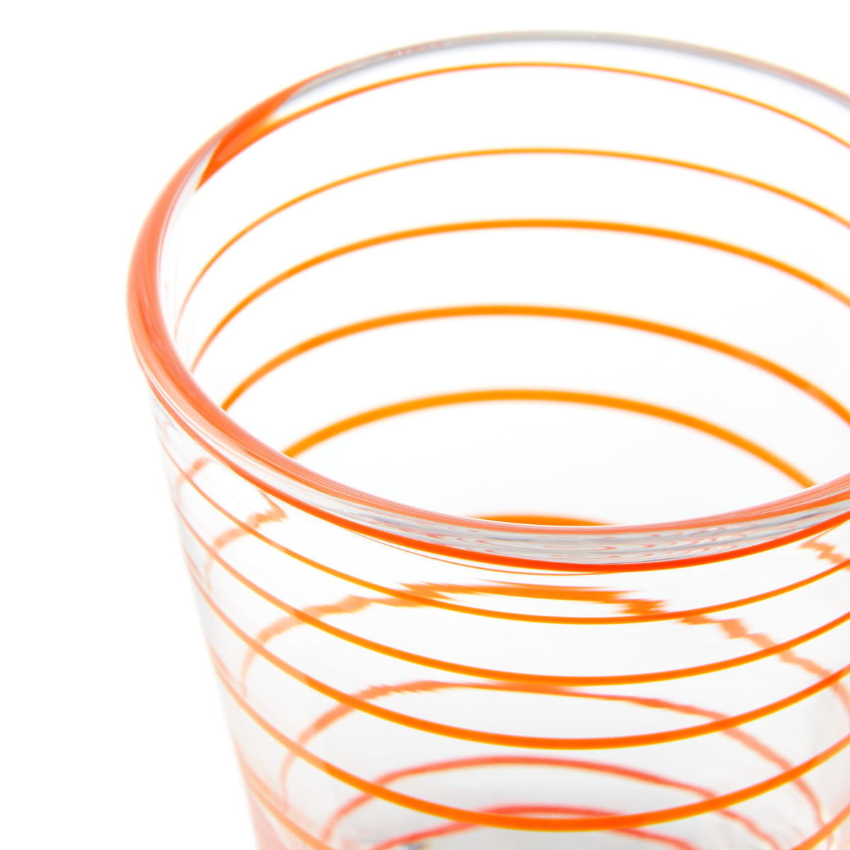 Nina Campbell Swirl Tumbler Orange against a white background close up rim